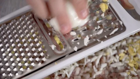 4k, Preparation of a dish herring under a fur coat.Eggs, Russian national dish. Stock Footage 101281279