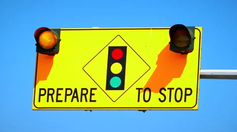 4K Prepare to Stop Traffic Sign, Flashing Lights, Slow Zoom Stock Footage 66009839