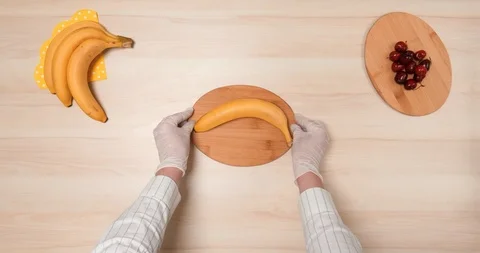 4K - Preparing Bananas for Cooking. time lapse Stock Footage 120484334