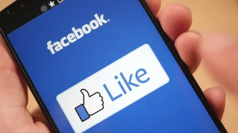 4K Pressing The Facebook Like Button on Smartphone Stock Footage 65823100