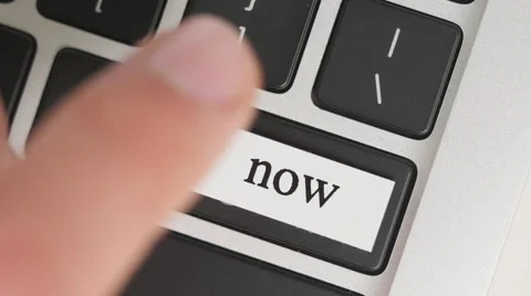 4K Pressing NOW Button On Computer Keyboard Stock Footage 56703192