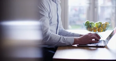 4K Professional man working from home on laptop Stock Footage 107806512