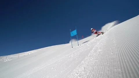 4K professional ski racer skiing giant slalom trainings course Stock Footage 115970287