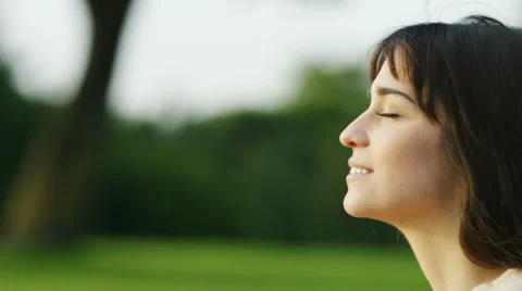 4K Profile portrait of a woman looking a... | Stock Video | Pond5