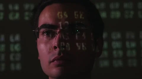 4K Programmer Portrait With Green Codes Around Stock Footage 67456304