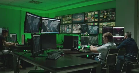 4K Programmers using many laptops computers  following information, statistics . Stock Footage 163546238
