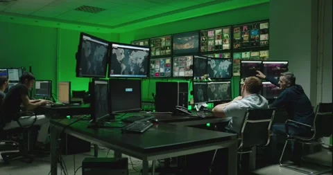 4K Programmers using many laptops computers  following information, statistics . Stock Footage 163546992