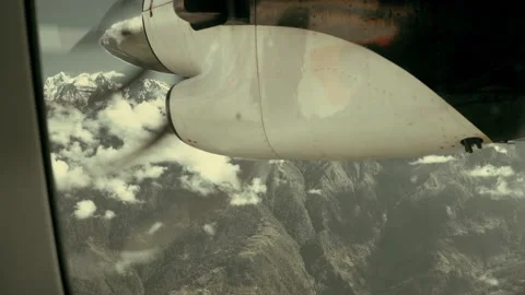 4K Propeller of aircraft engine rotating in flight over Himalayan mountains Stock Footage 131286276