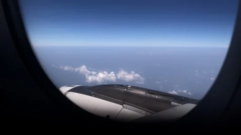 4K public air plane wing on blue sky with beautiful cloudy on morning Video stock 88773394