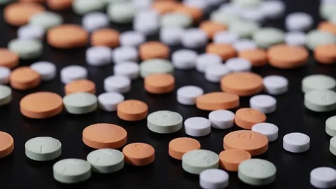 4K Pull Focus on Pills on a Table Video stock 74973196