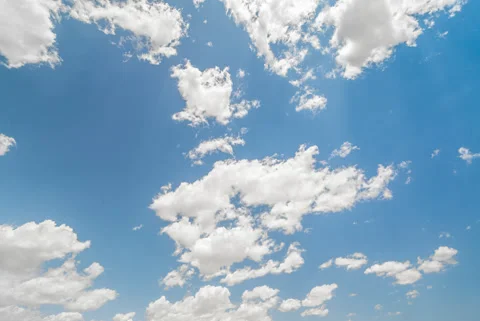 4K Pure Blue Sky with Fluffy White Clouds Time-lapse Stock Footage 337544090