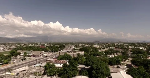 4K Push and Pull at Low Altitude Aerial of NEighborhood in Jamaica- LUT Applied 動画素材 70173349