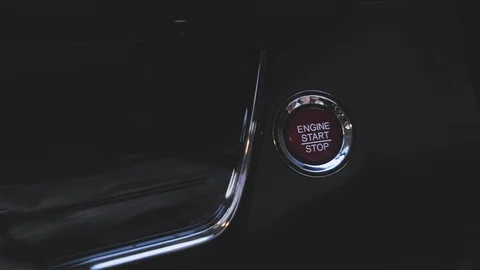 4K. Push start engine button. Finger press the button to start the car engine Stock Footage 116686649