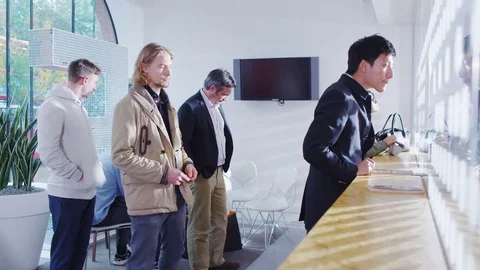 4K Queue of people waiting in line to be served Stock Footage 74139318