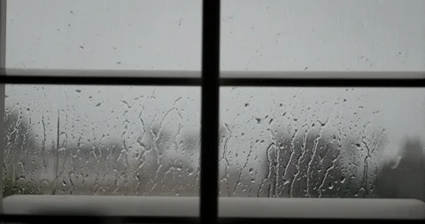 4K Rain against a window with shutters during the day Stock Footage 99070111
