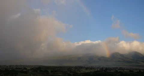 4K Rainbow hitting the mountains Stock Footage 100107038