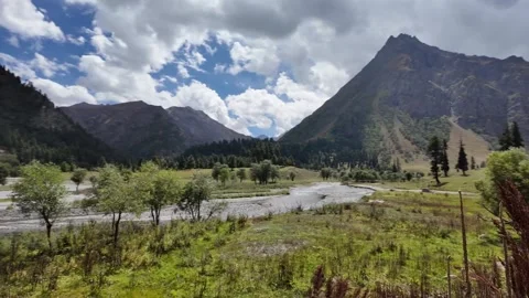 4K Rainforest Valley Breathtaking Mountain Range with River, Lush Green Land Stock Footage 287998525