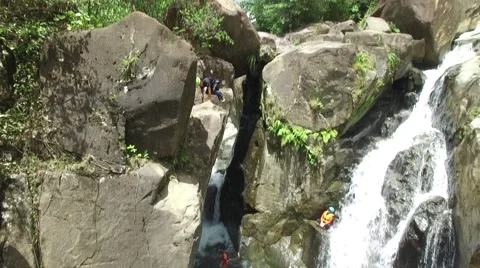 4K Rainforest Waterfall Flip Jump  Stock Footage 63618104