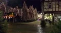 4k Raining at Christmas fair with illuminated christmas trees 4k or 4k+ Resolution