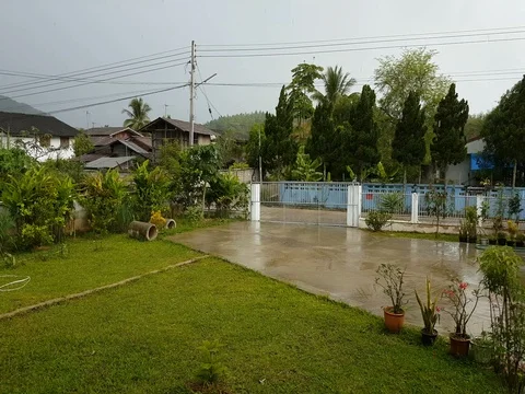 4K raining in the countryside, Thailand Stock Footage