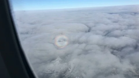 4K Rare Glory With Plane Shadow Cast Inside Video stock 100935749