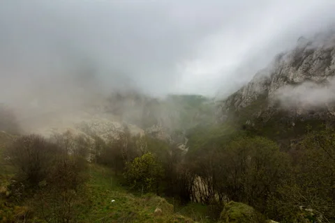 4k. A ray of sun and clouds in the mountains. Stock Footage 50683757