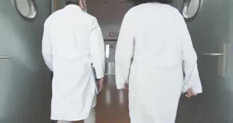 4k real time - Doctors rushing to the op... | Stock Video | Pond5
