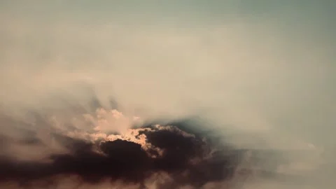 4k Real Time Pan Sun Rays Beaming Behind Dark Sunset Cloud Jakarta Indonesia Stock Footage 345975543