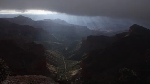 4K Real Time of sun rays through low clouds at the Grand Canyon North Rim Stock Footage 241286984