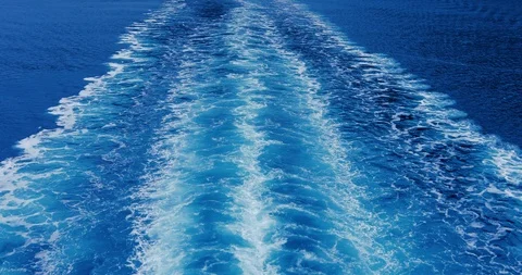 4K real video wave drawing of the ship's motion on the sea Stock Footage 114954331