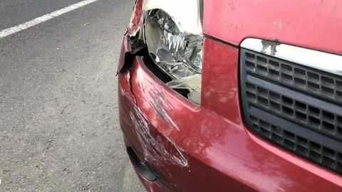 4k Red broken car with damaged headlamp closeup Stock Footage 113754203