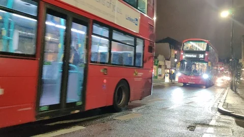 4K, Red Double Decker Buses in London on Streets Stock Footage 123871518