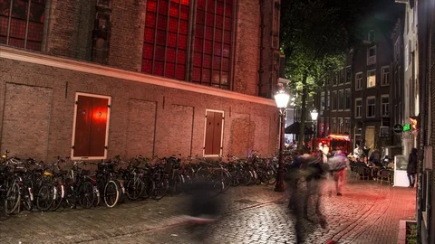 4K Red Light District In Amsterdam And De Oude Kerk vertical pan Video stock 100987847
