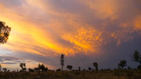 4K, reddish sunset in the desert of Australia Stock Footage 106930226