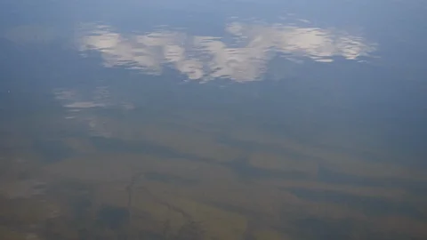 4K. Reflection of clouds in clear water of Volga-Don Canal Stock Footage 96294269