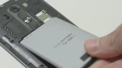 4K Replacing Smartphone Battery Stock Footage 63238411