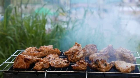 4k resolution. Juicy, appetizing pieces of meat with a crusty crust Video stock 73599361