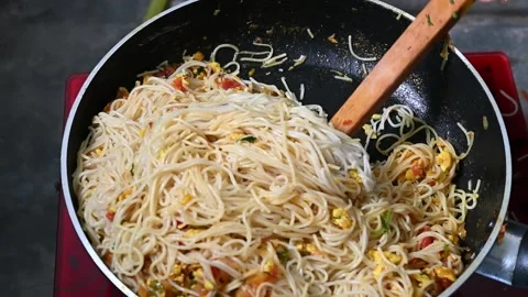 4K resolution super slow motion close up chef cooking fried noodle in pan, s Stock Footage 203476418