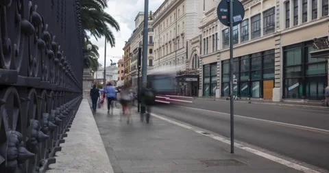4k resolution time-lapse view of people walking and cars traffic in Rome, Italy Stock Footage 243873092