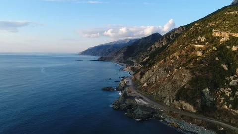 4K resolution video with drone of the sea and mountains at sunset. Stock Footage 100727176