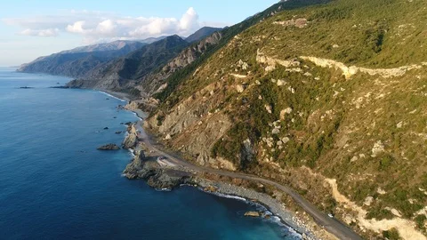 4K resolution video with drone of the sea and mountains at sunset. Stock Footage 100727353