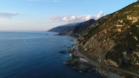 4K resolution video with drone of the sea and mountains at sunset. Stock Footage 100727383