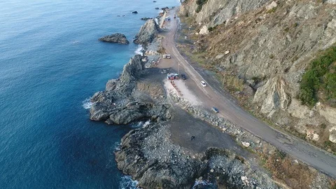 4K resolution video with drone of the sea and mountains at sunset. Stock Footage 100727916
