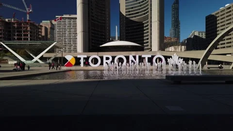 4K Reveal Shot of New Toronto sign and City Hall on a Sunny Day During COVID-19 Stock Footage
