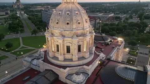 4K Reverse Aerial Shot Of Dome Atop Saint Paul Capitol Building At Sunset Stock Footage 223501569