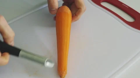 4K - REVERSE carrot pelling Stock Footage 61545466