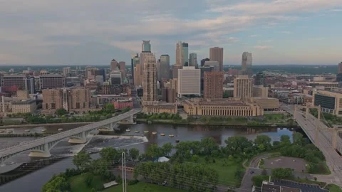 4K Reverse Drone Shot of Minneapolis Skyline Overlooking St. Anthony Falls Stock Footage 283339256