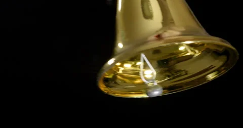 4K - Ring christmas bell. Slow motion. Close-up Stock Footage 255568412