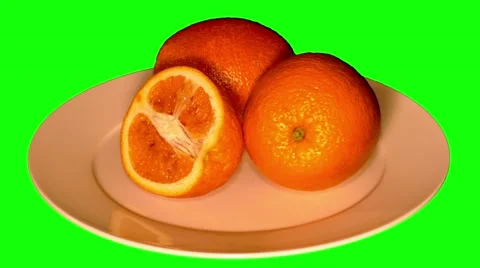4k ripe oranges and half on plate Stock Footage 50018043