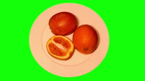 4k ripe oranges on plate Stock Footage 49615811